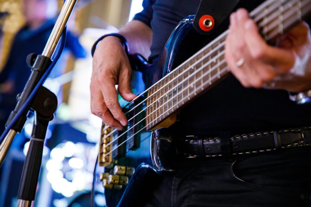 a musician plays the bass guitar 2022 11 03 05 19 56 utc
