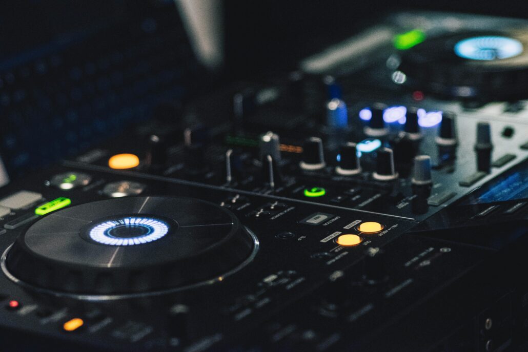 Shallow focus photography of black dj controller
